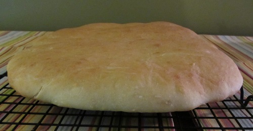 Very foreshortened. It's 13" wide and 18" long.